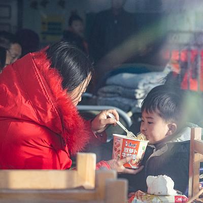 Heaters, hot meals keep people warm at earthquake shelters