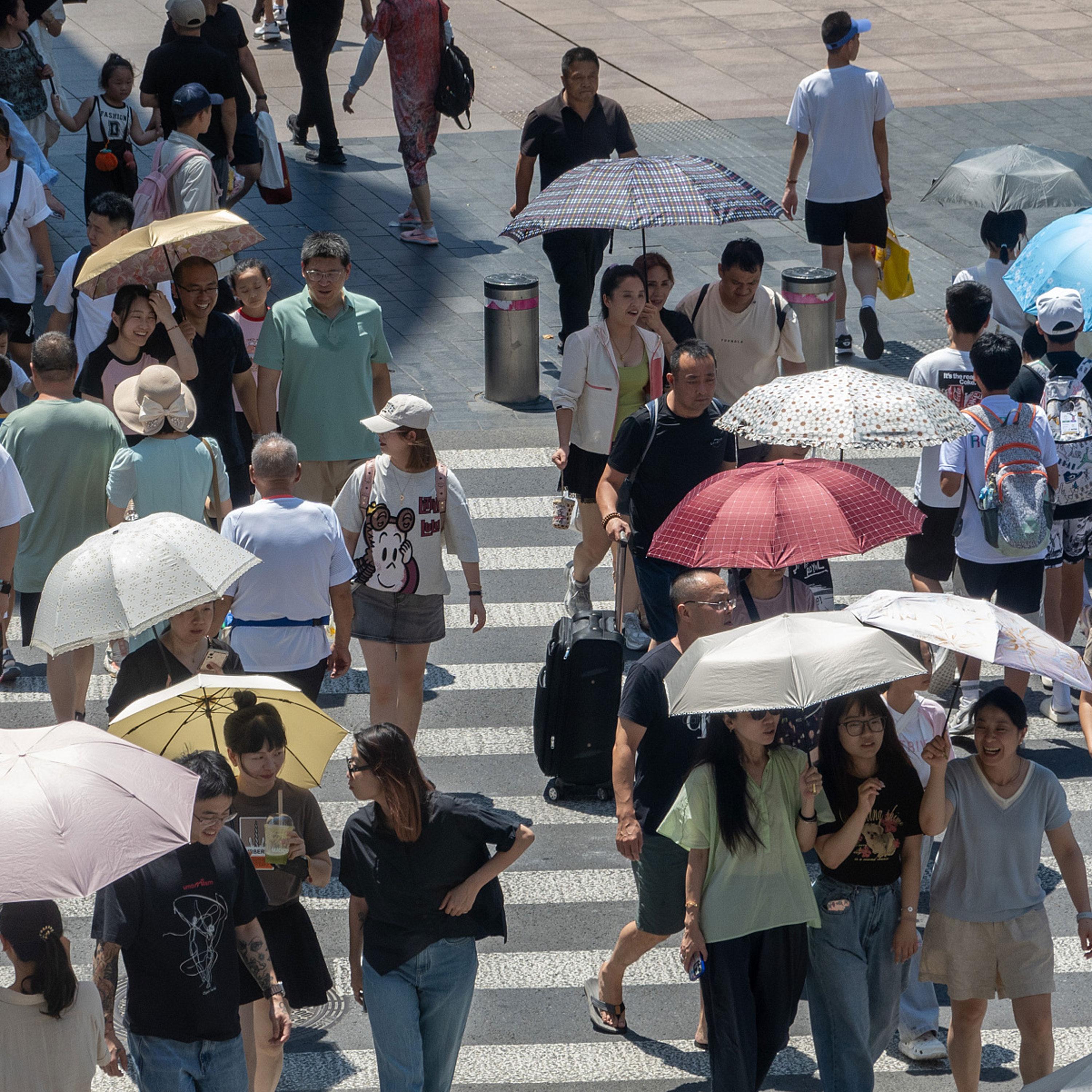 Heat wave lingers over Shanghai and other east China regions