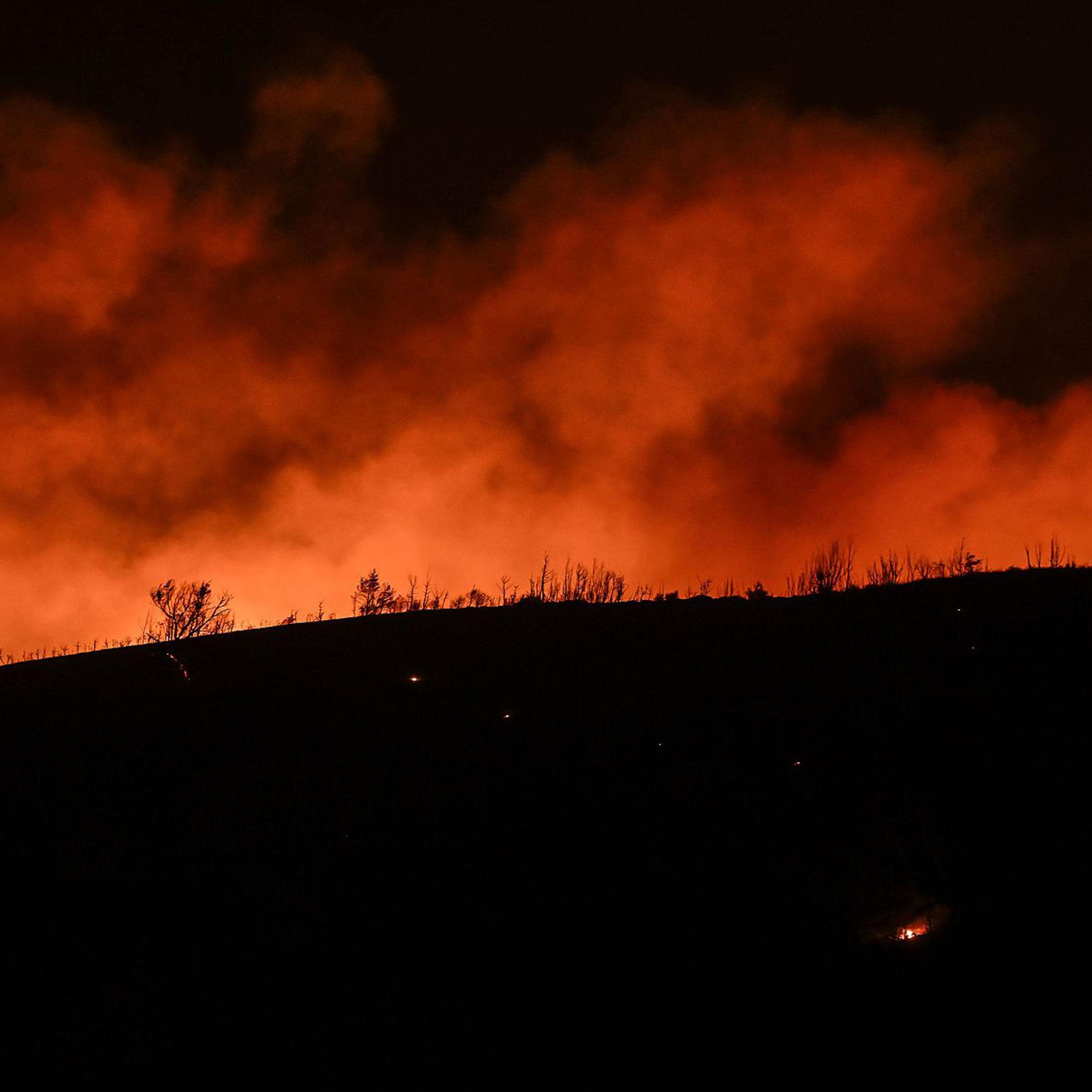Wildfires rage in Greece, forcing evacuation