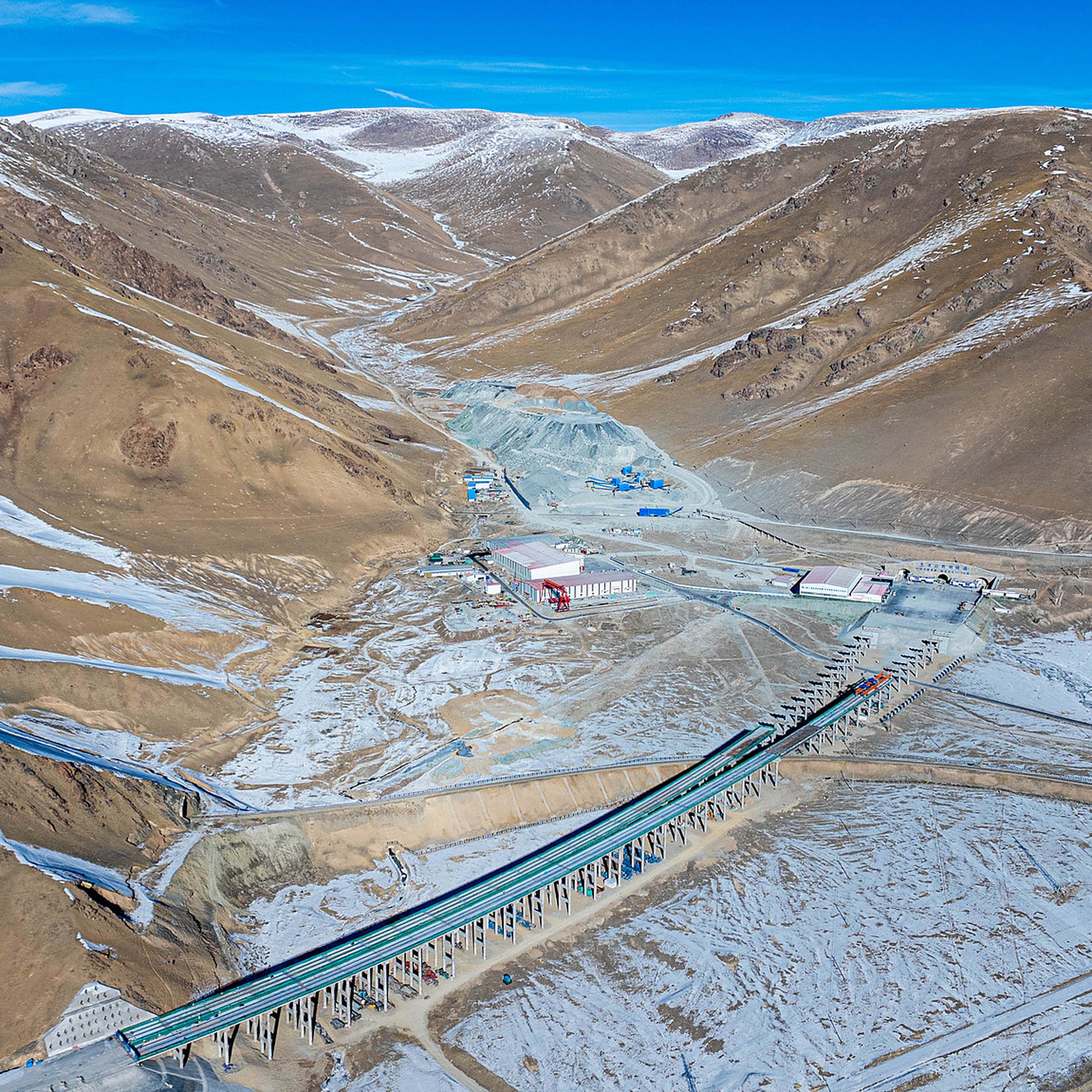 Xinjiang completes world's longest expressway tunnel through challenging mountains