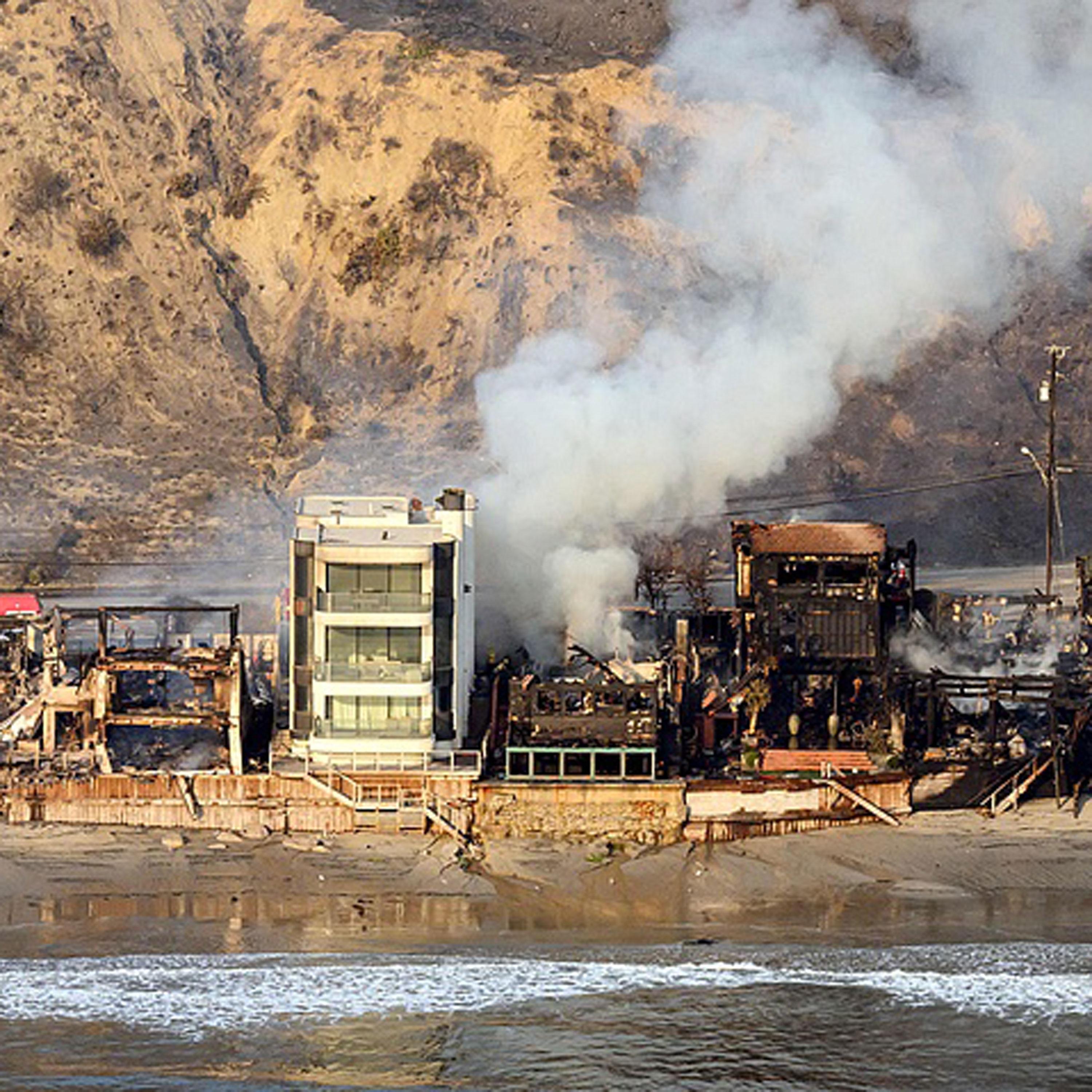 Fierce wildfires in LA force 180,000 people to flee homes
