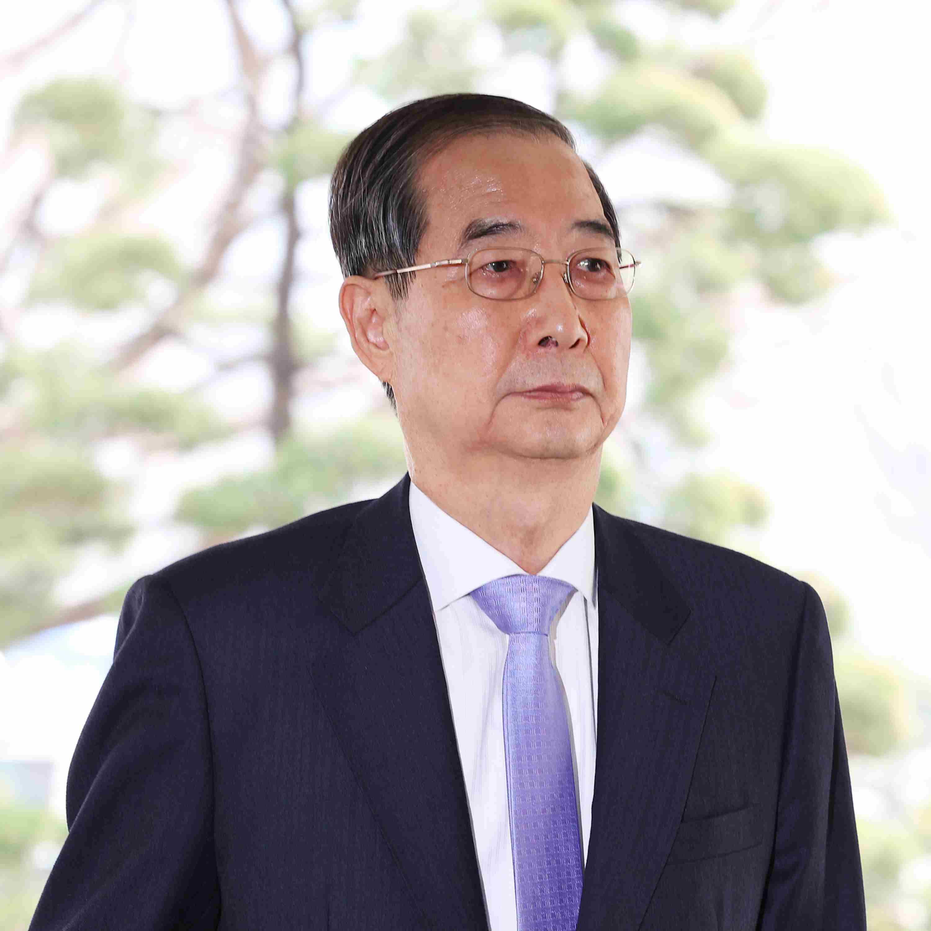 South Korean court reinstates PM as acting president after overturning impeachment