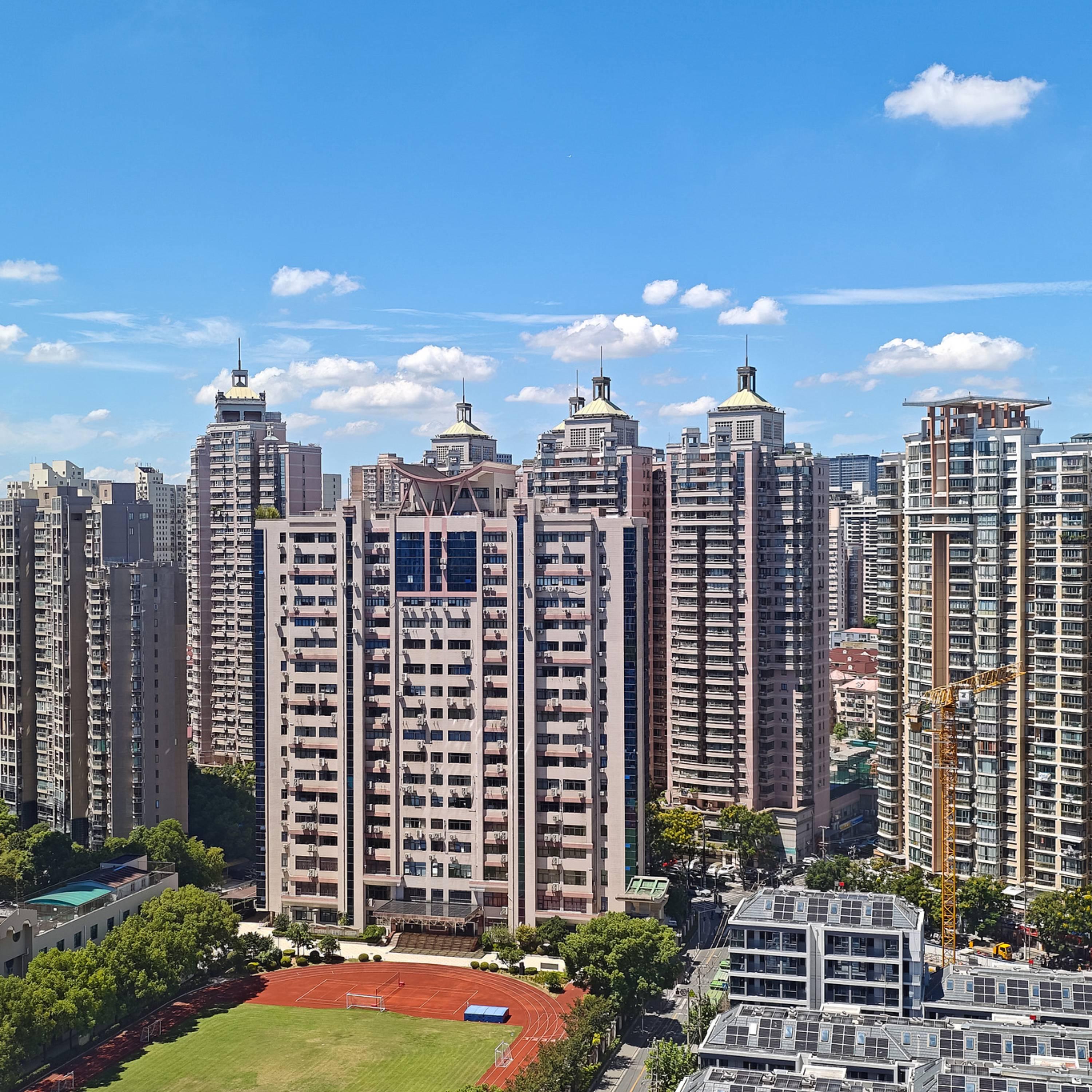 Shanghai eases property rules to boost housing market