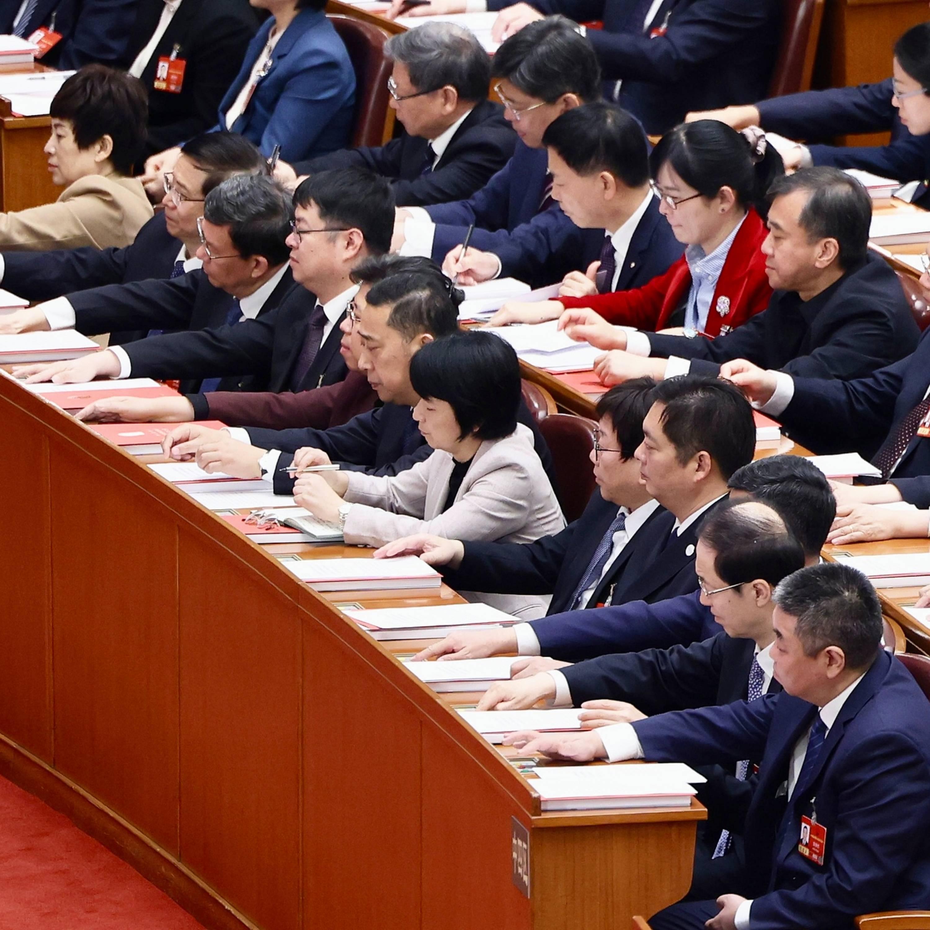 Chinese lawmakers approve government work report, outline for 15th Five-Year Plan