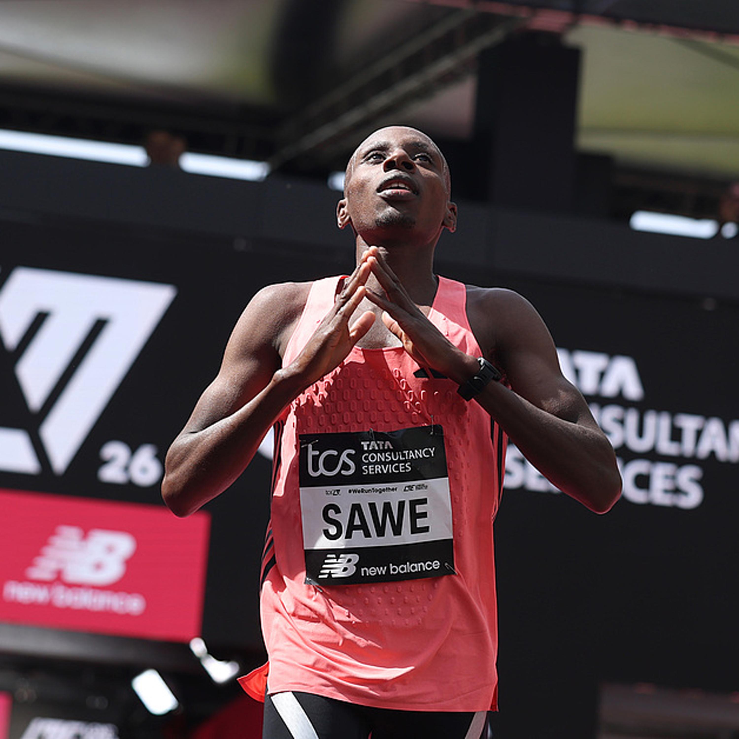 Kenya's Sawe becomes first man to run marathon under two hours