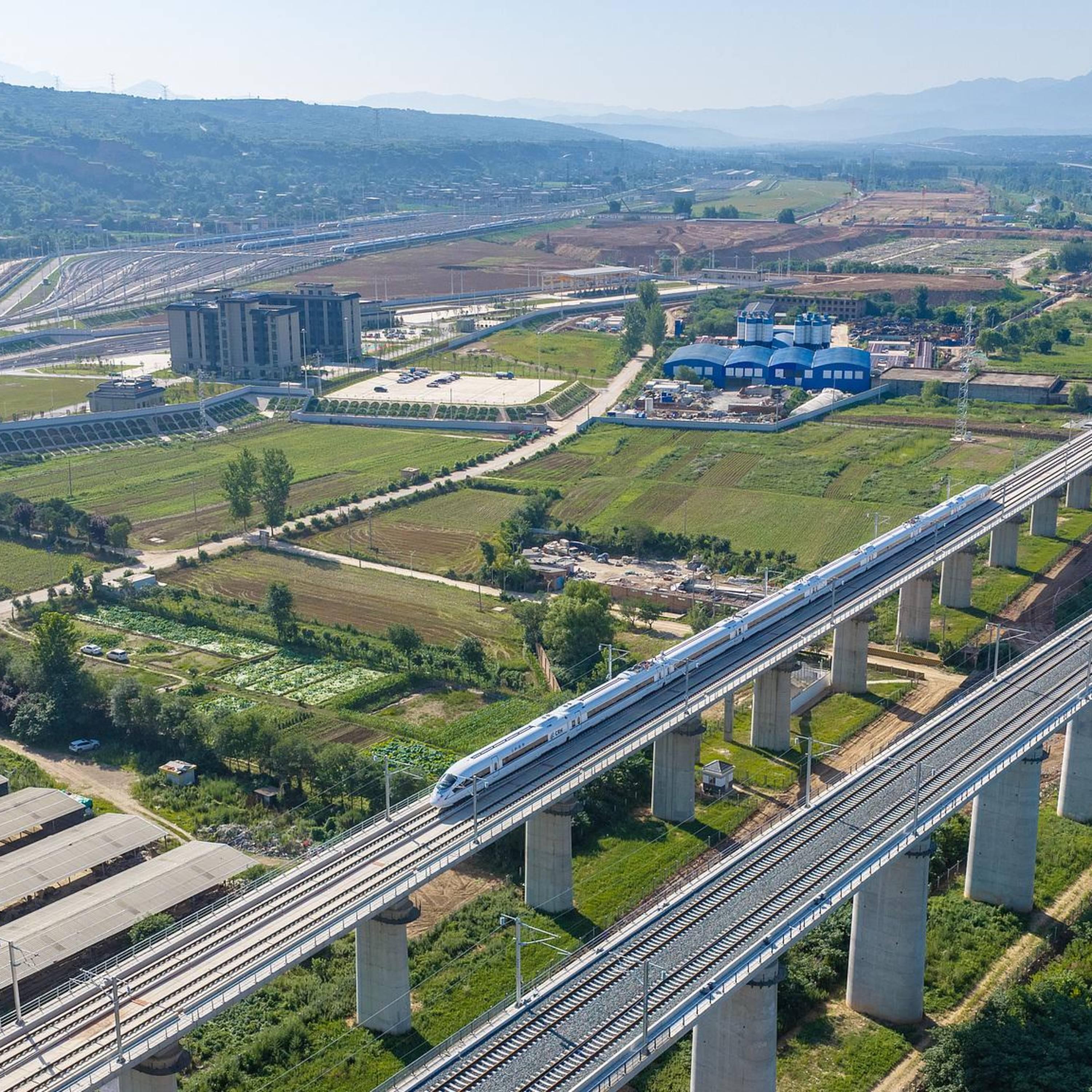New high-speed rail bridges central, northwest China for coordinated development episode artwork