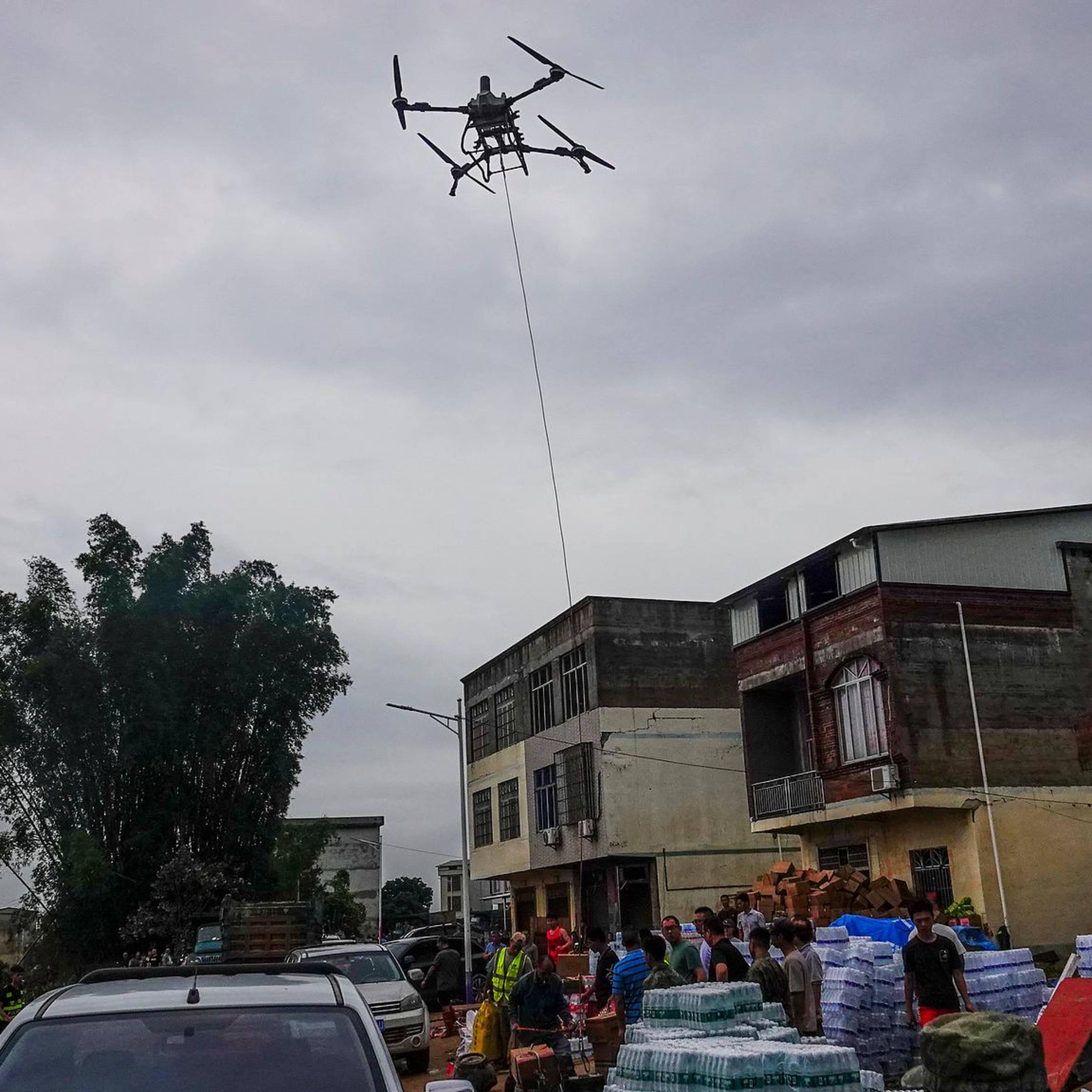 Drones deliver supplies, mobile signal in flood-hit Guangxi episode artwork
