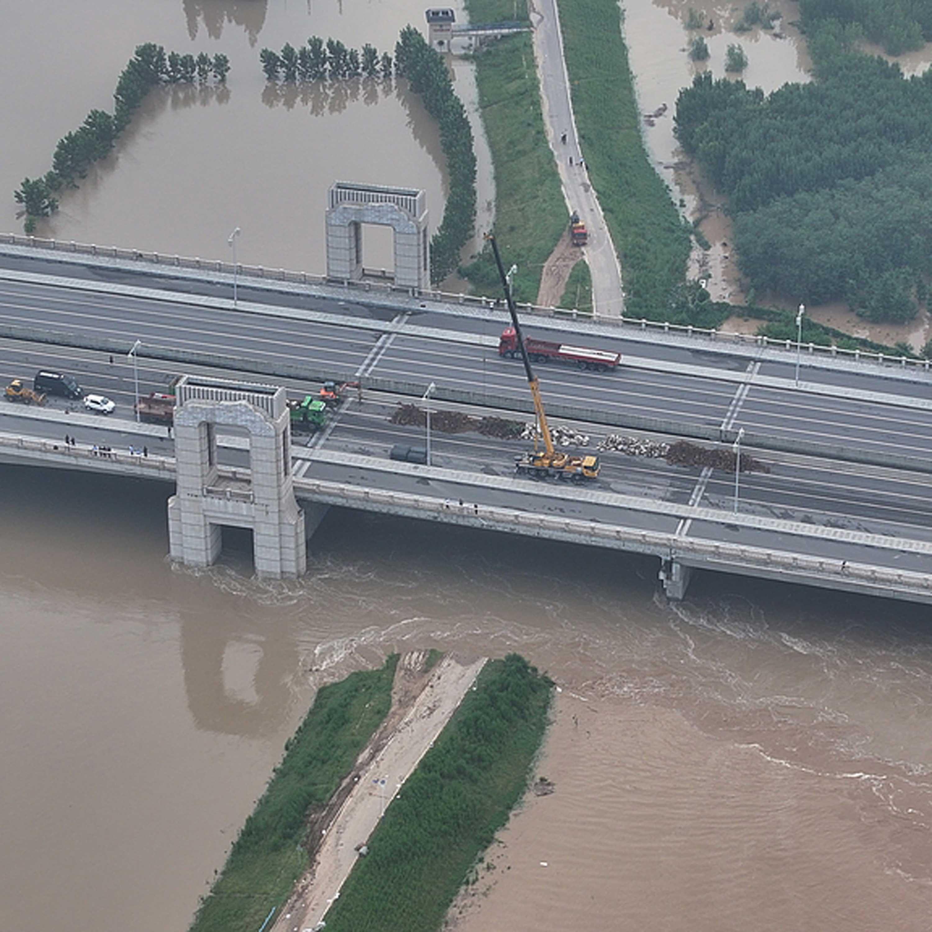 China sends rescue teams to Henan after levee breach episode artwork