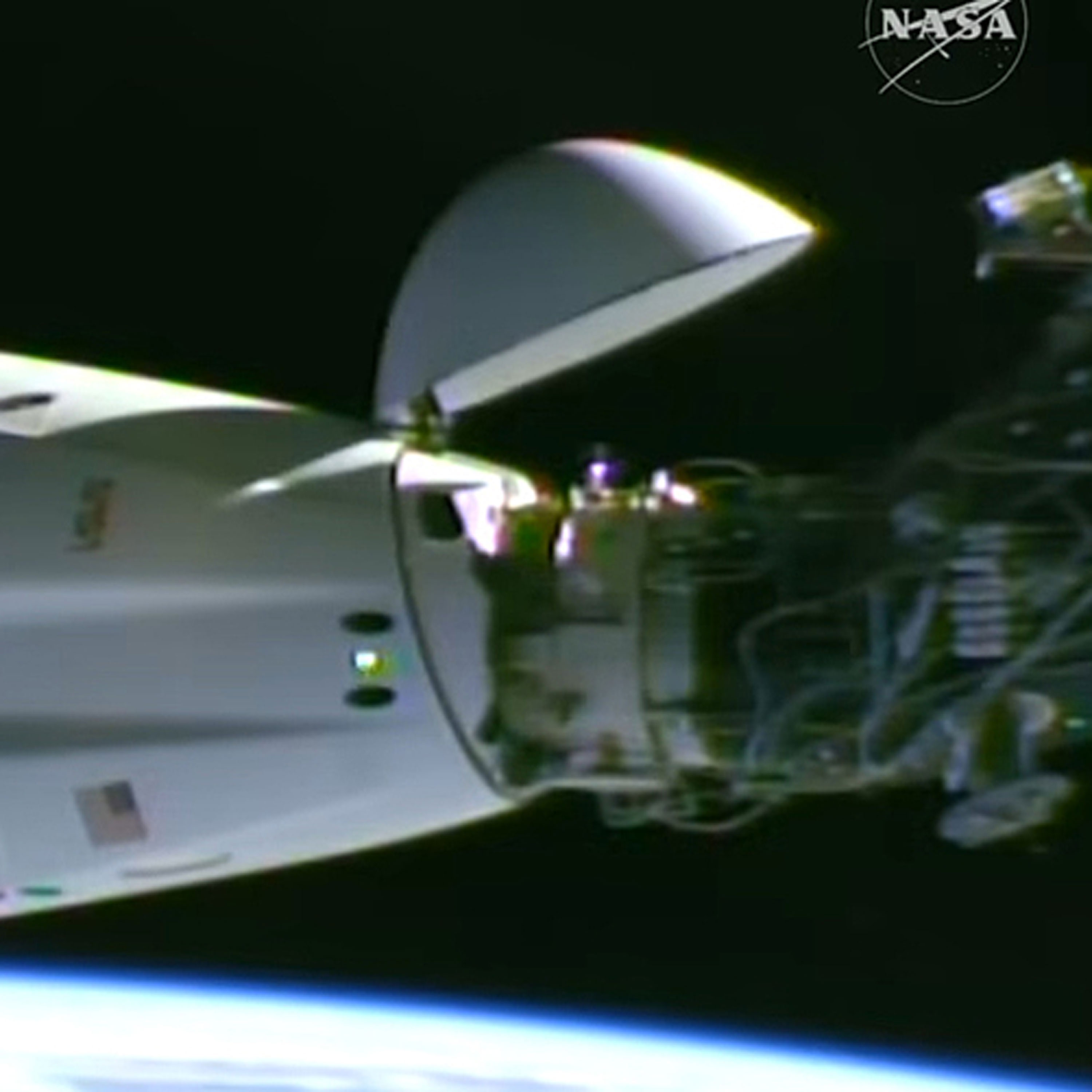 SpaceX Dragon spacecraft docks with ISS carrying Crew-13 astronauts episode artwork